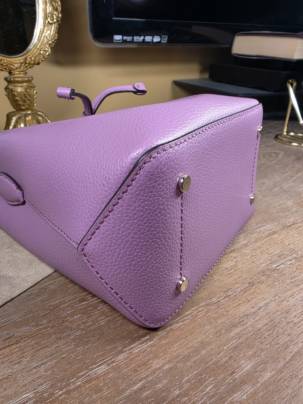 kate spade New York Eva Lavender Mauve Pebbled Leather Bucket Crossbody ($329)